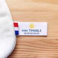 Étiquettes personnalisées pour doudous perdus avec texte, numéro de téléphone et motif étoile. Trouvez facilement votre doudou égaré !