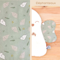 Avec des petits éléphants gris et blancs sur un fond vert clair, ces ailes sont un choix amusant et adorable pour votre enfant.