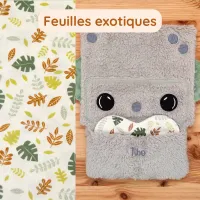 Doudou Tibo le Robot avec coussinet Feuilles Exotiques. Un doudou unique pour bébé, qui garde l’odeur de ses parents pour le rassurer.