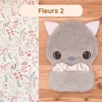 Avec son coussinet Fleurs 2 qui porte votre odeur maternelle, le doudou Garou le Loup apaise votre bébé de la plus douce des façons