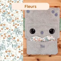 Tibo le Robot et son coussinet Fleurs, un doudou apaisant qui rassure bébé en capturant l’odeur maternelle.