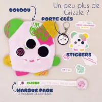 Vue d’ensemble des produits Grizzle – doudou, porte-clés, stickers et marque-page brodé
