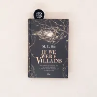 Marque-page Meuulky inséré dans un livre