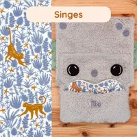 Tibo le Robot et son coussinet Singes, un doudou apaisant conçu pour calmer bébé en conservant l’odeur maternelle.